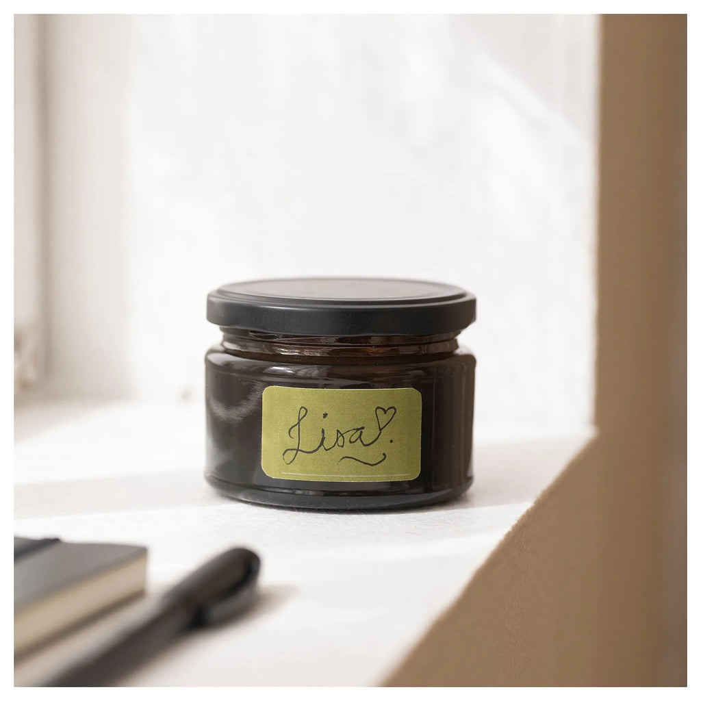 شمع معطر اسود بغطاء