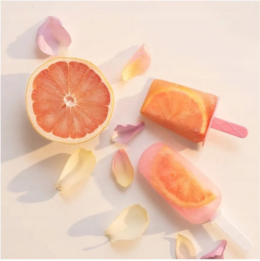 شمع معطر وردي بغطاء